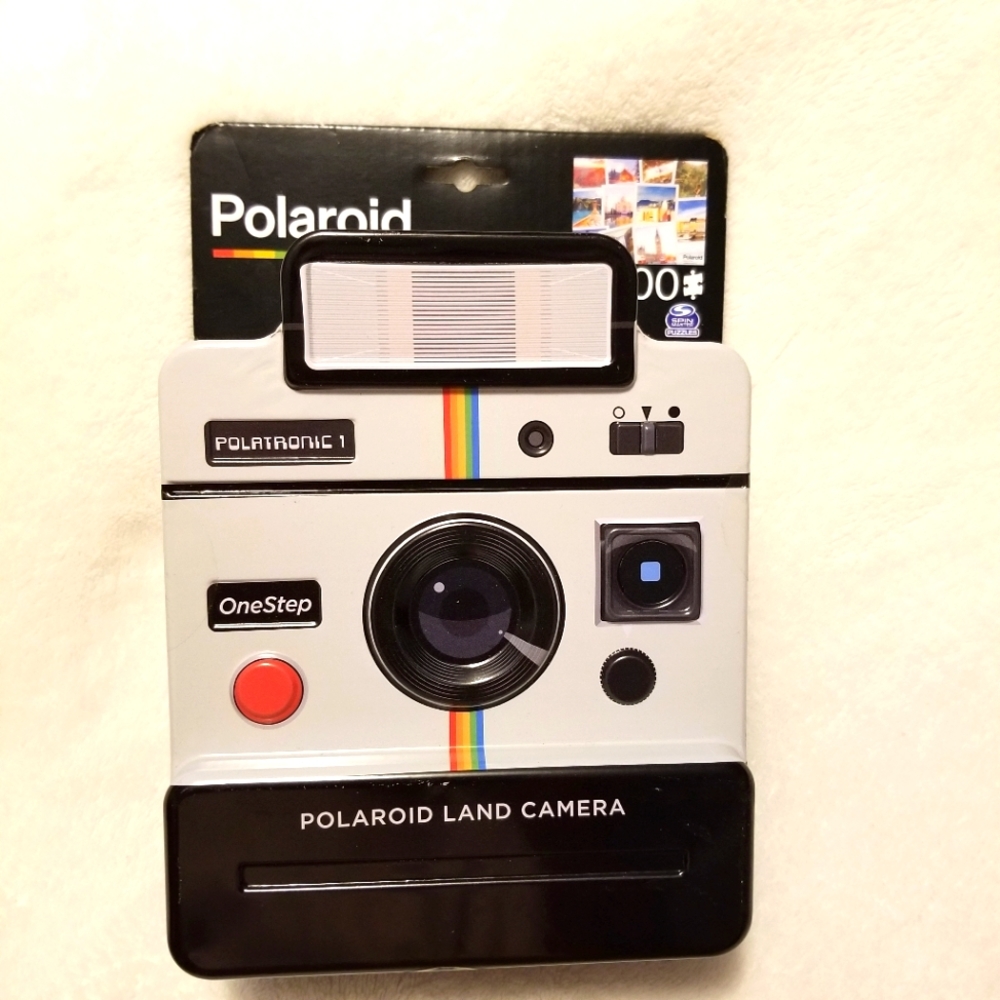 Spinmaster 500 Piece Jigsaw Puzzle Travel Bug/Globe Trotter Polaroid Camera Tin